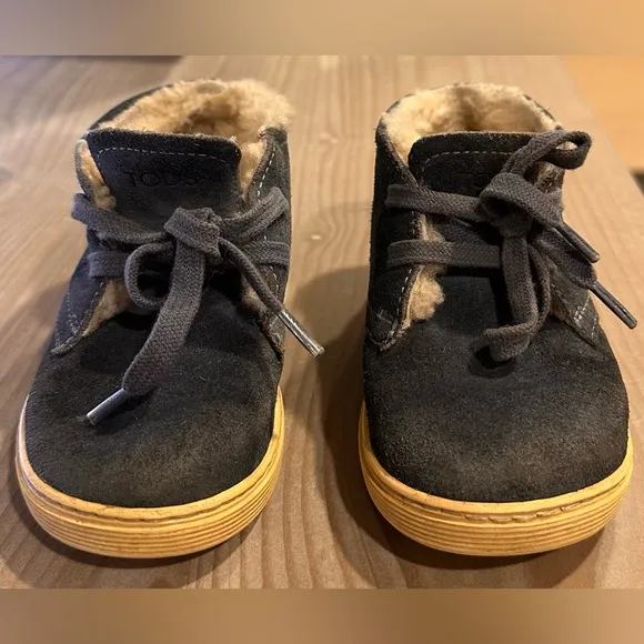 18. Kids Tod’s Junior Periwinkle Blue Suede Fleece Boots