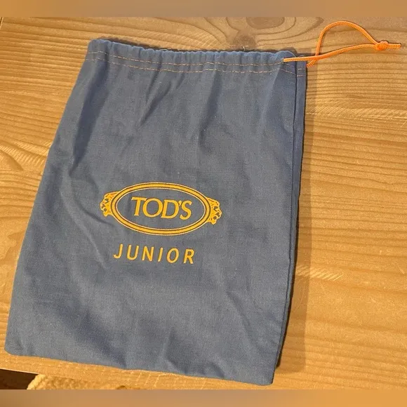 18. Kids Tod’s Junior Periwinkle Blue Suede Fleece Boots