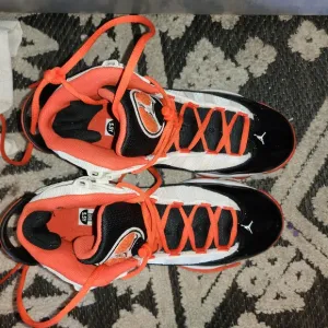 Air Jordan Black and Orange Sneakers