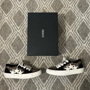 Amiri Leopard Print Sneakers with Stars