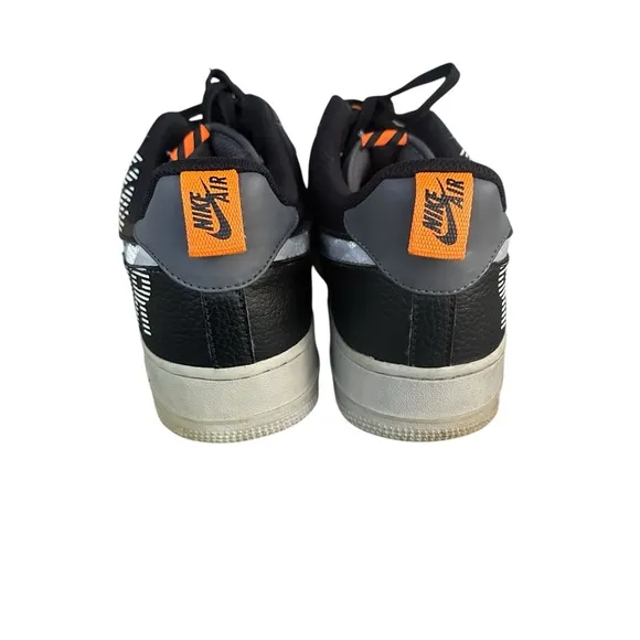Black and White Air Sneakers with Orange Accent