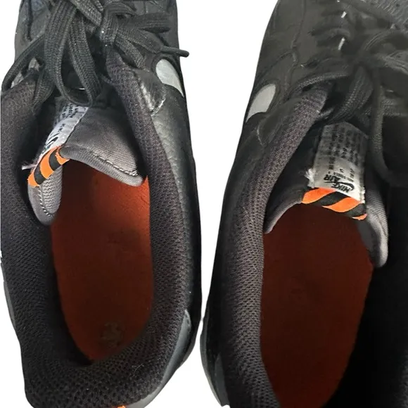 Black and White Air Sneakers with Orange Accent