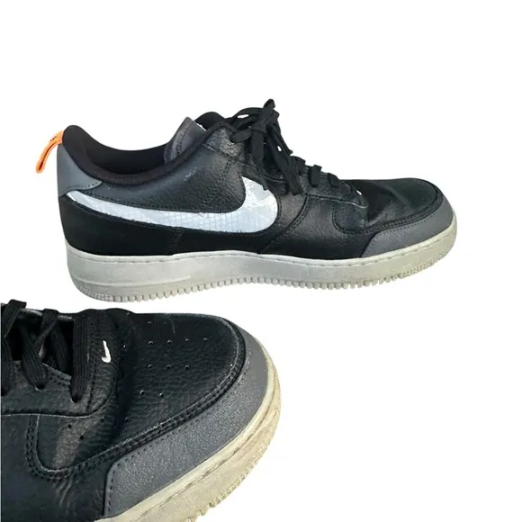 Black and White Air Sneakers with Orange Accent
