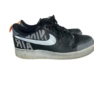 Black and White Air Sneakers with Orange Accent