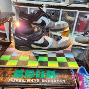 Black and White Sneakers with Orange Accents