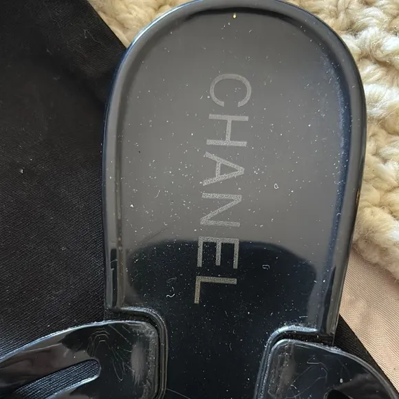 CHANEL Black Sandals with Camellia Embellishment