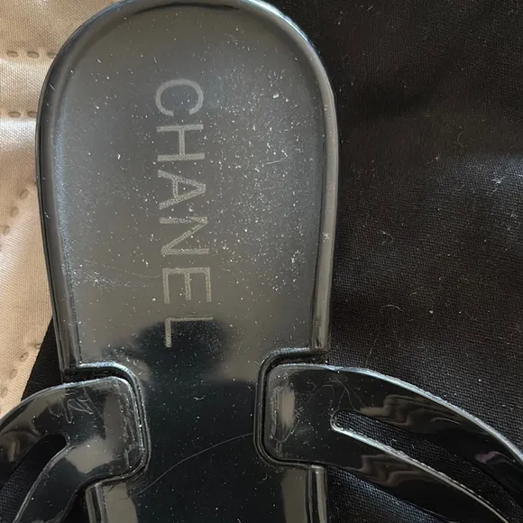 CHANEL Black Sandals with Camellia Embellishment