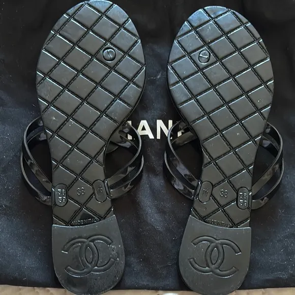 CHANEL Black Sandals with Camellia Embellishment