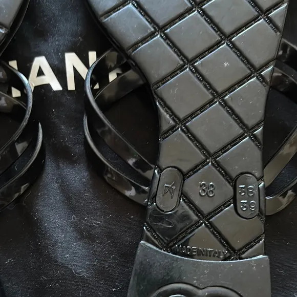 CHANEL Black Sandals with Camellia Embellishment