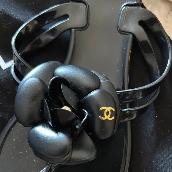 CHANEL Black Sandals with Camellia Embellishment