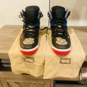 Gucci High-Top Sneakers with Red and Black Accents