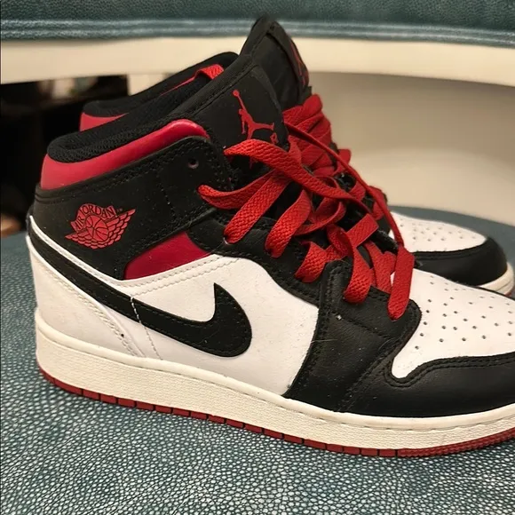 Jordan 1 Black and Red High-Top Sneakers