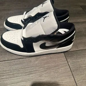 Jordan 1 Low SE Black and White Sneakers
