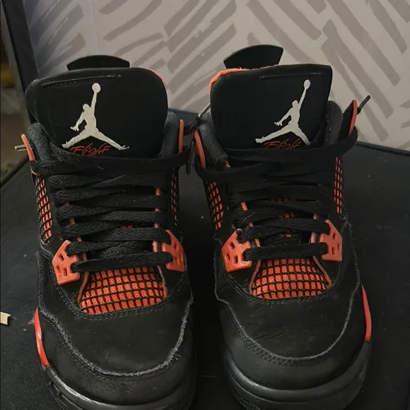 jordan 4 red thunders slightly used