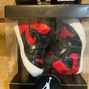 Jordan Black and Red Sneakers with Iconic Design
