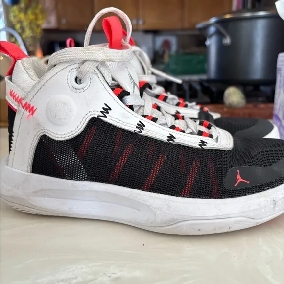 Jordan Black and White Sneakers with Textured Upper and Contrasting Midsole
