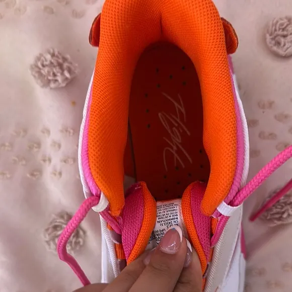 Jordan Pink and Orange Sneakers with Bold Color Blocking