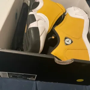 Jordan Yellow and Black Sneakers Bold Design