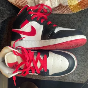 Kids Black and White Sneakers with Red Accents