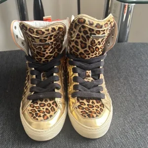 Leopard Print High-Top Sneakers with Gold Accents