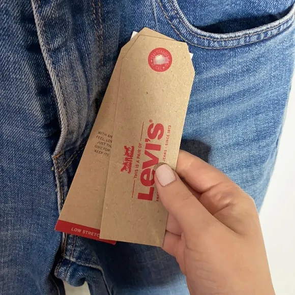 Levi's 721 High Rise Skinny Jeans with rip knee size 25