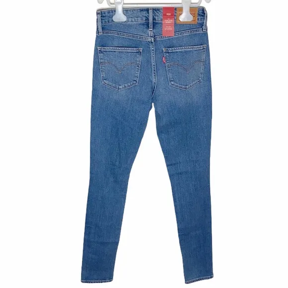 Levi's 721 High Rise Skinny Jeans with rip knee size 25