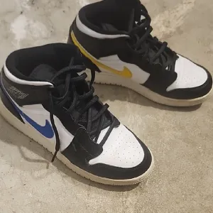 Men's Black and White Sneakers with Blue and Yellow Accents