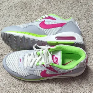 Nike Air Correlate Vibrant Pink and Green Athletic Sneakers