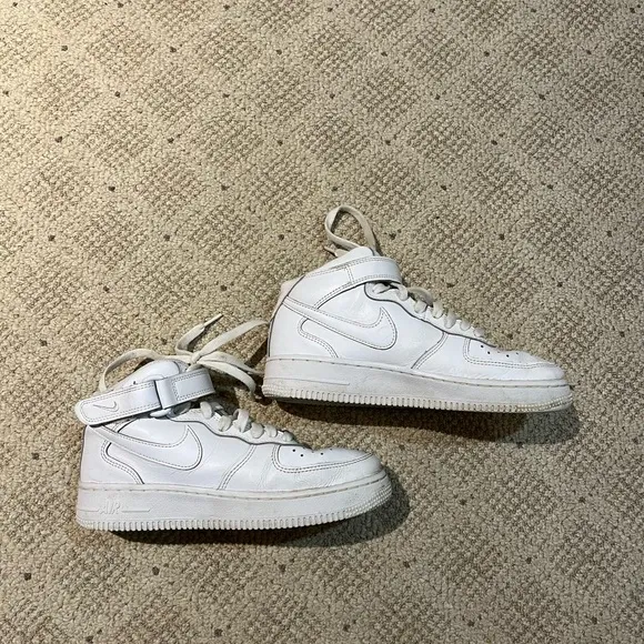 Nike Air Force 1 High Top Leather Sneakers.