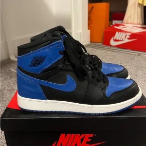 Nike Air Jordan 1 High Black and Blue Sneakers
