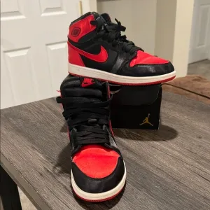 Nike Air Jordan 1 High Red and Black Sneakers