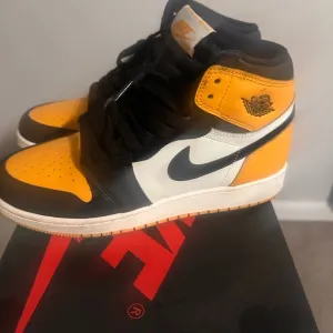 Nike Air Jordan High-Top Sneakers in Black, White, and Yellow