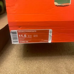 Nike Air Max Hyperposite in Bold Orange