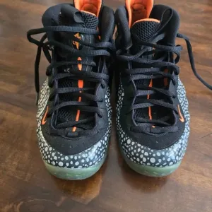 Nike Black and Orange Foamposite Sneakers