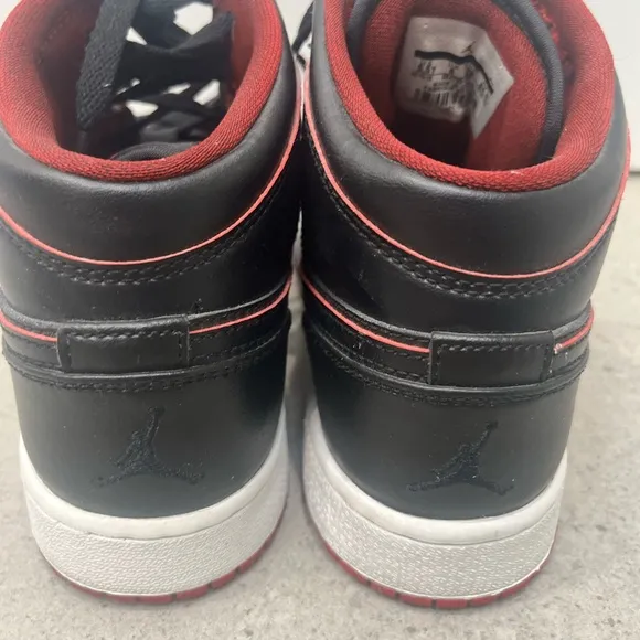 Nike Black and Red High-Top Sneakers with Leather Upper