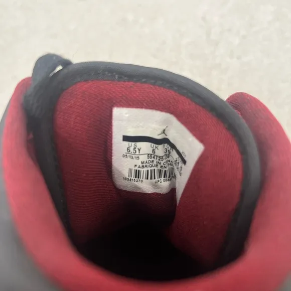 Nike Black and Red High-Top Sneakers with Leather Upper