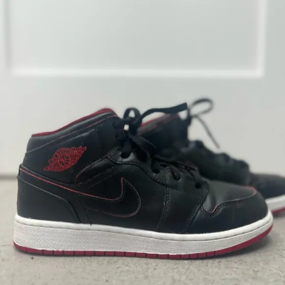 Nike Black and Red High-Top Sneakers with Leather Upper
