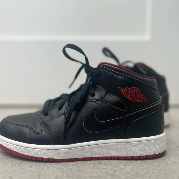 Nike Black and Red High-Top Sneakers with Leather Upper