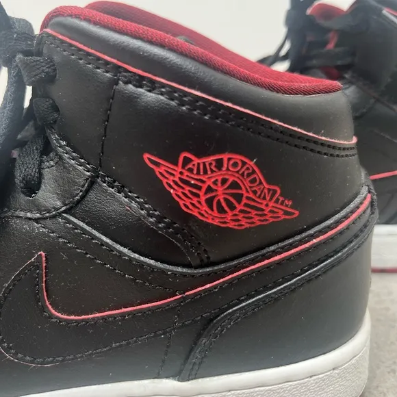 Nike Black and Red High-Top Sneakers with Leather Upper