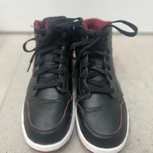 Nike Black and Red High-Top Sneakers with Leather Upper