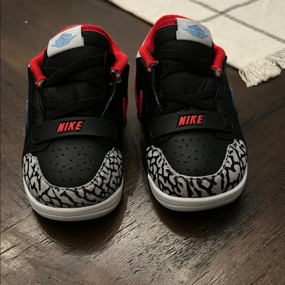 Nike Black and Red Sneakers with Blue Swoosh