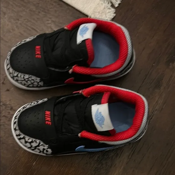 Nike Black and Red Sneakers with Blue Swoosh