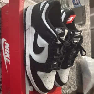 Nike Black and White Sneakers Iconic Dunk Silhouette