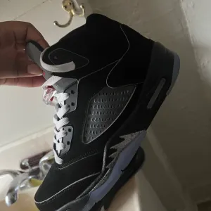 Nike Black and White Sneakers with Shark Tooth Design