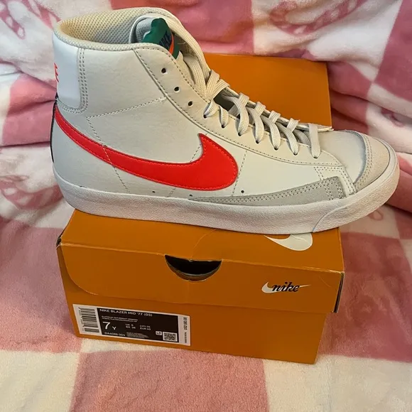 Nike High-Top Sneakers with Red Swoosh