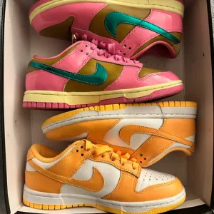 Nike Pink and Orange Sneakers Vibrant Low-Top Design