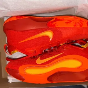 Nike Red and Orange Sneakers with Dynamic Design