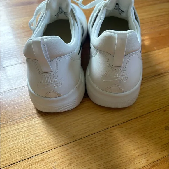 NYJAH Nike White and Black Low-Top Sneakers