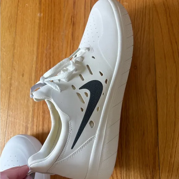 NYJAH Nike White and Black Low-Top Sneakers