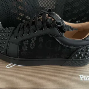 red bottom sneakers